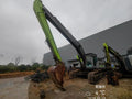 ZE500G‑5017 — long‑reach arm, Wuhu, manufactured 2023, 4,299 hours, bucket fitted.