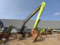 ZE500G‑5018 — long‑reach arm, Wuhu, manufactured 2023, 4,393 hours, bucket fitted.